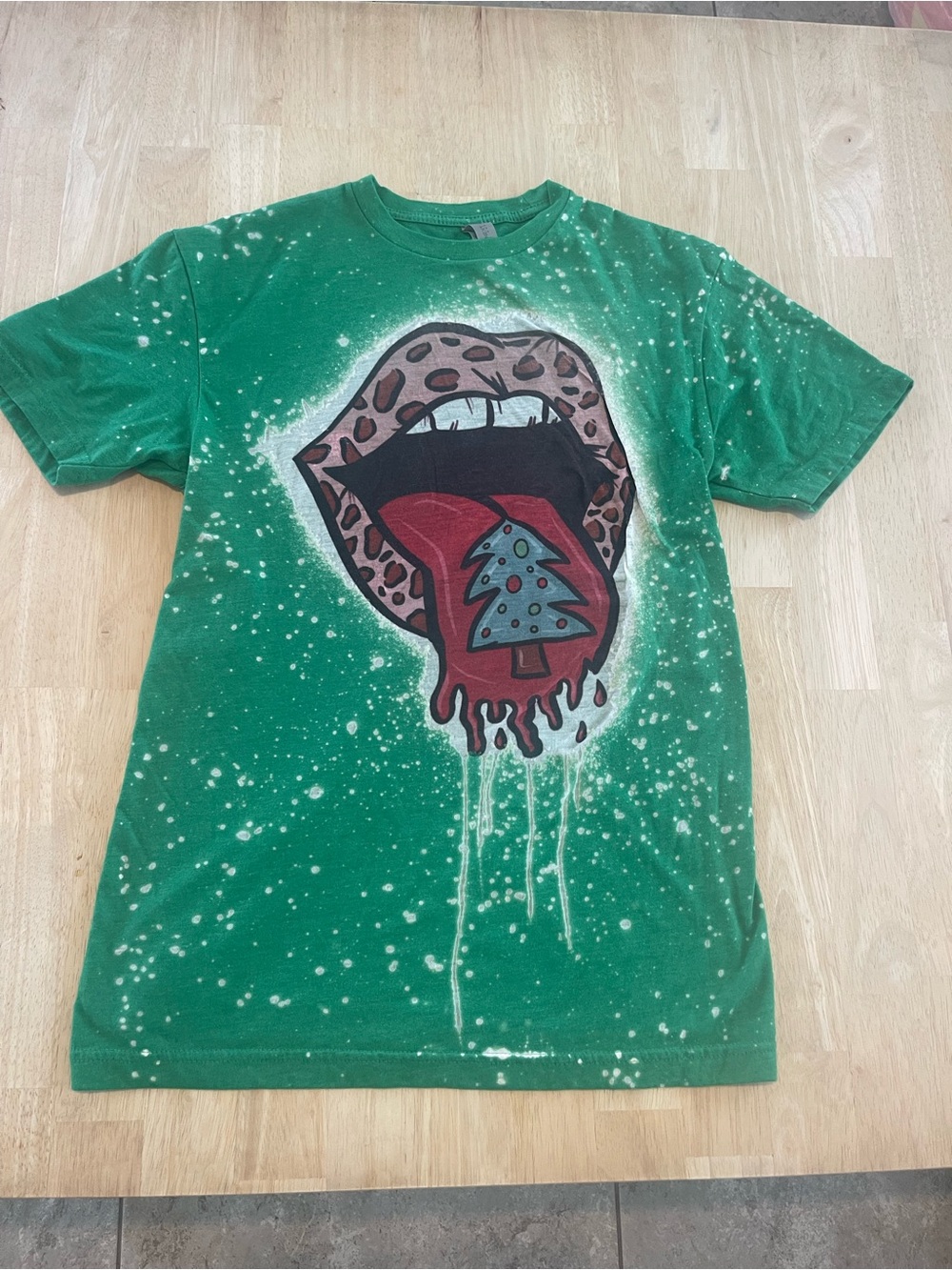 Next Level Apparel Green Graphic Tee with Christmas tree on the tongue Size S